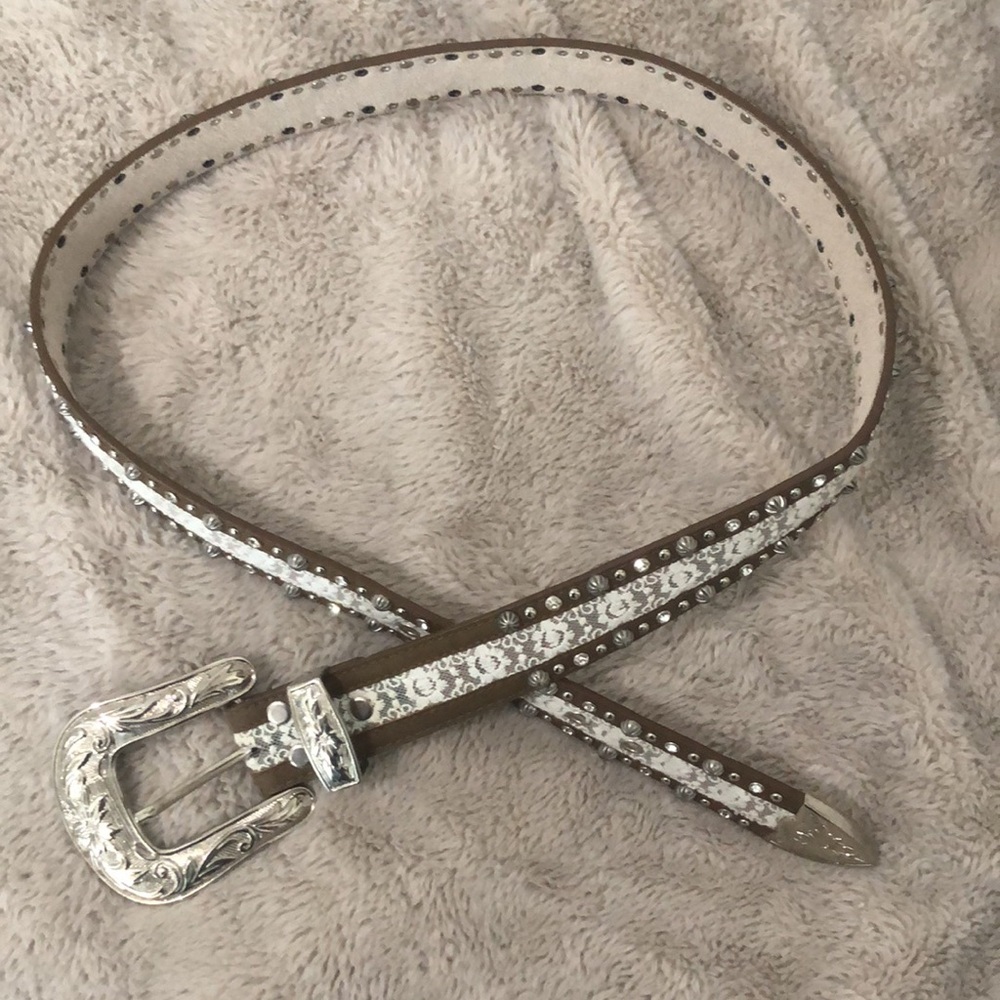 Western belt genuine leather with lace pattern down middle.